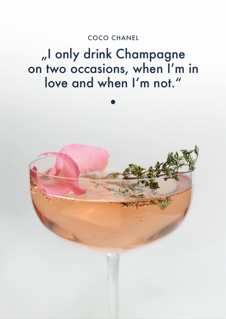 drink decorated with rose petals, quoting Coco Chanel "I only drink Champagne on two occasions, when I'm in love and when I'm not."