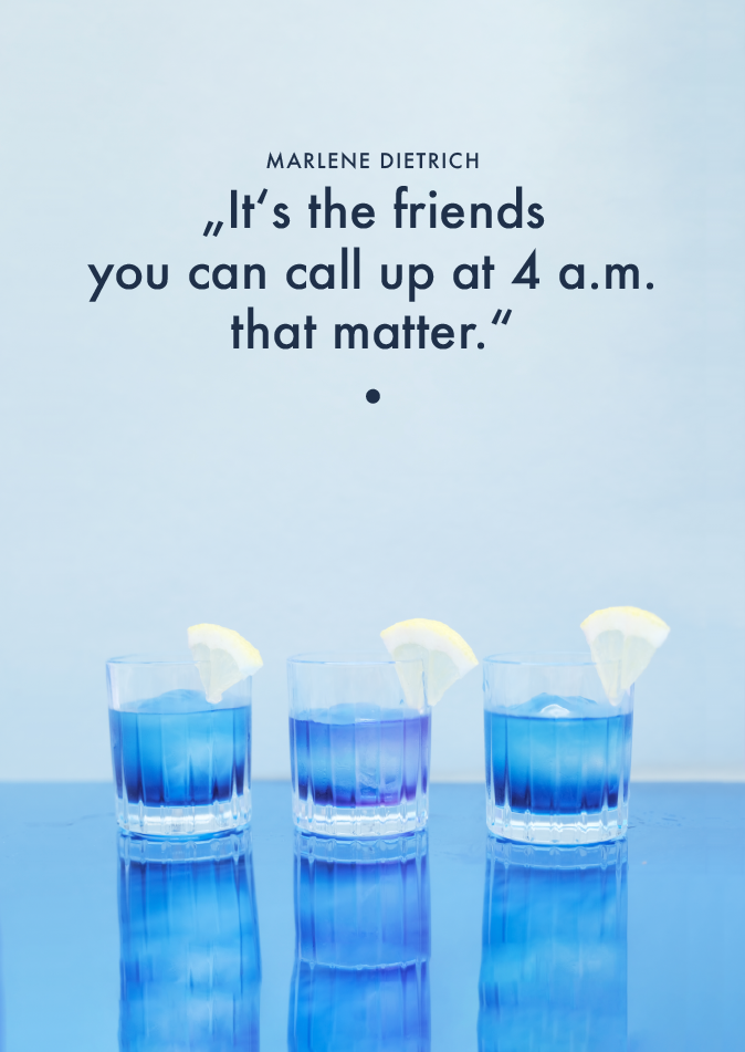 3 blue drinks decorated with lemon wheel quoting Marlene Dietrich "It's the friends you can call up at 4 am that matter."